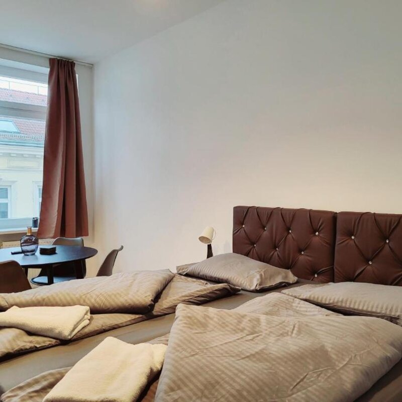 Furnished 1-room apartment with double bed & dining area – short-term rental Vienna, temporary housing for 1 to 6 months