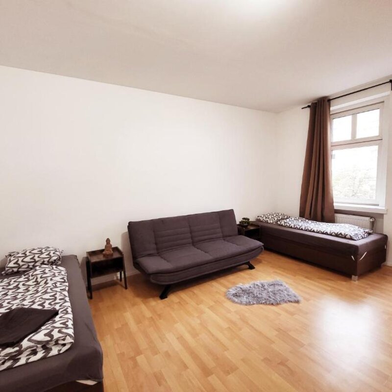 Helles Zimmer mit 2 Einzelbetten & Sofa – 2-Zimmer-Wohnung zur Kurzzeitmiete, Wohnen auf Zeit 1 bis 6 Monate, Wien