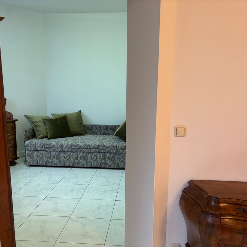 Schlafzimmer mit ausziehbarem Schlafsofa 