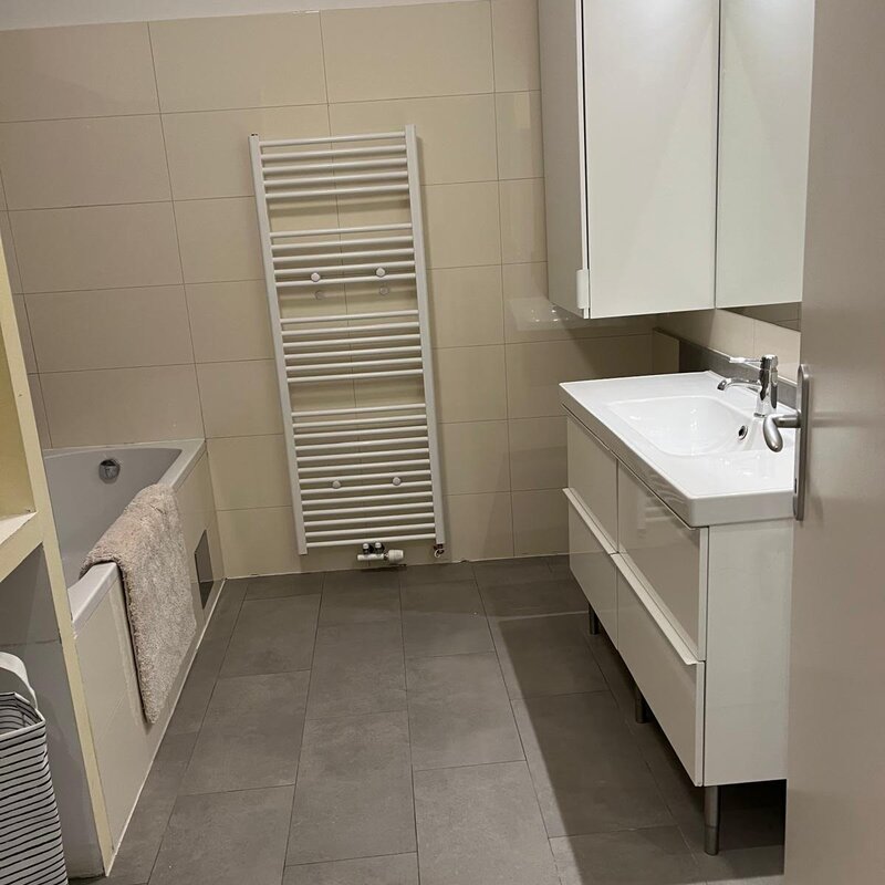 Bathroom with bathtub on the first floor