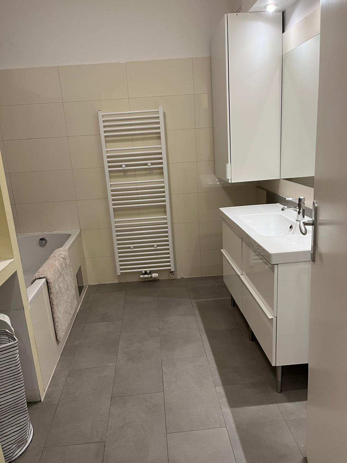 Bathroom with bathtub on the first floor