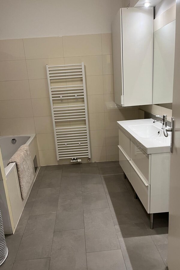 Bathroom with bathtub on the first floor