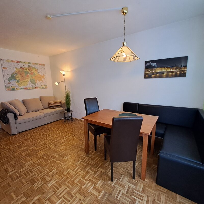 Bright living & dining area: furnished 2-room apartment for short-term rental & temporary housing, 1 to 6 months, Salzburg