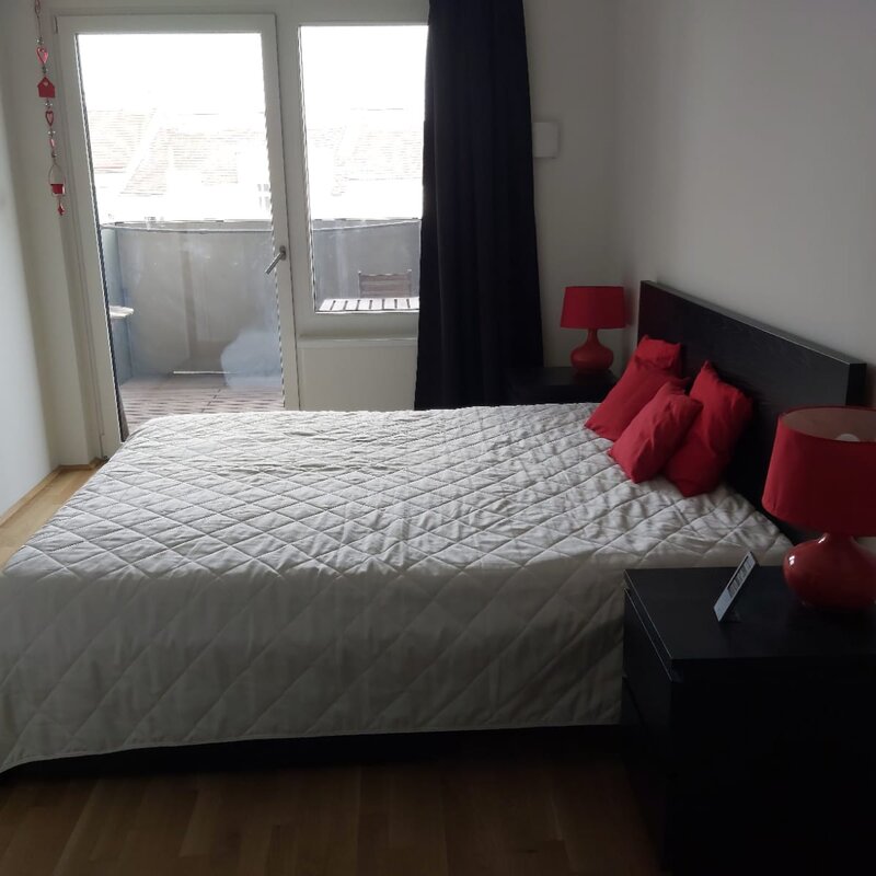Bedroom with entrance to balcony