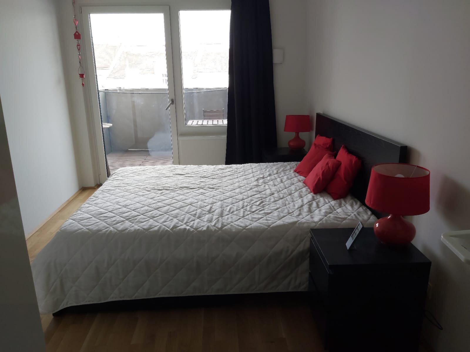 Bedroom with entrance to balcony