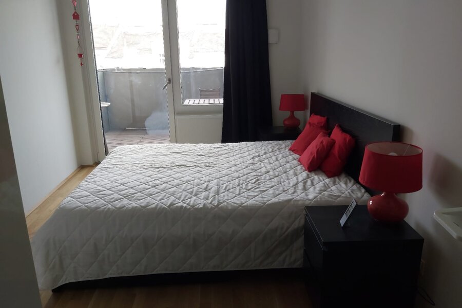 Bedroom with entrance to balcony