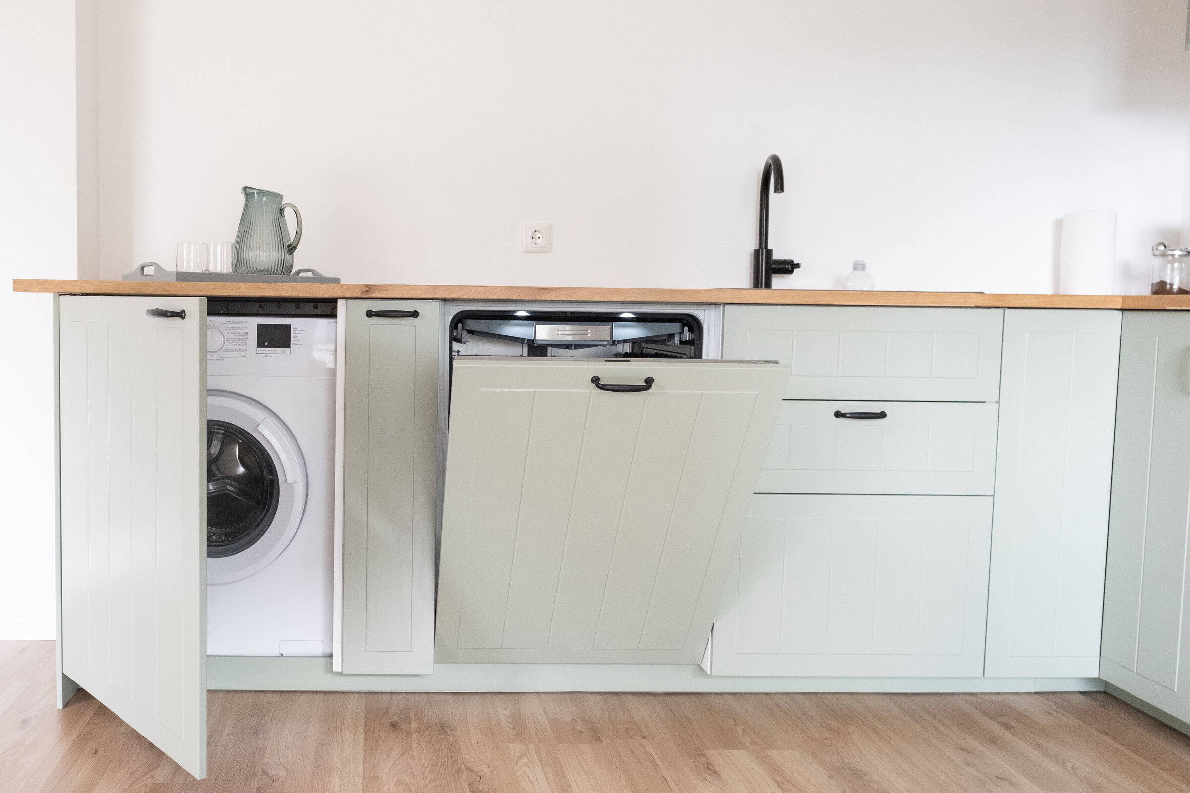 Washing machine and dishwasher including appropriate cleaning products