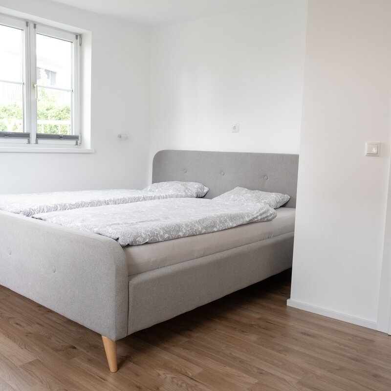 Windows overlooking the garden and the private street
