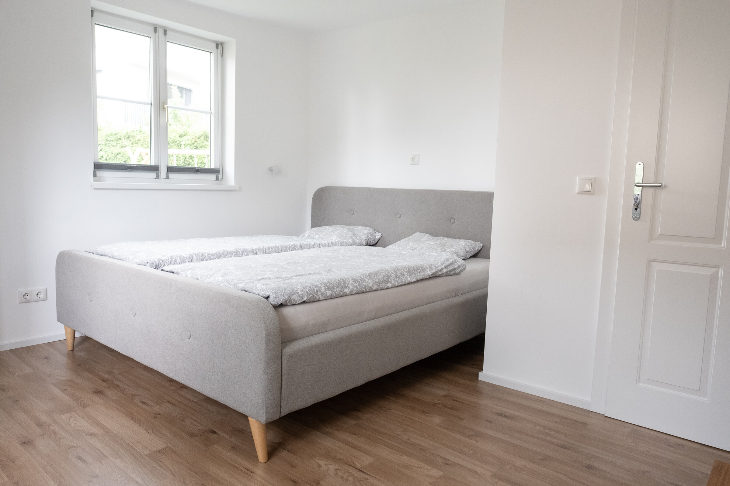 Windows overlooking the garden and the private street