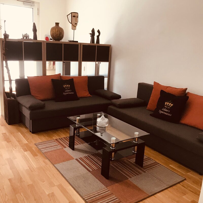 living room with 2 sofas