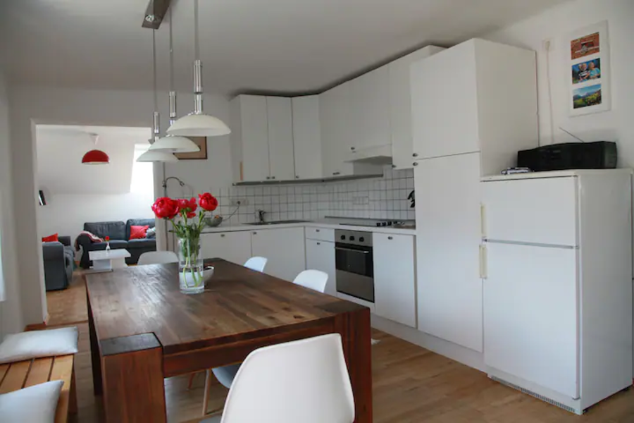 Large, bright kitchen. It leads directly into the living room.