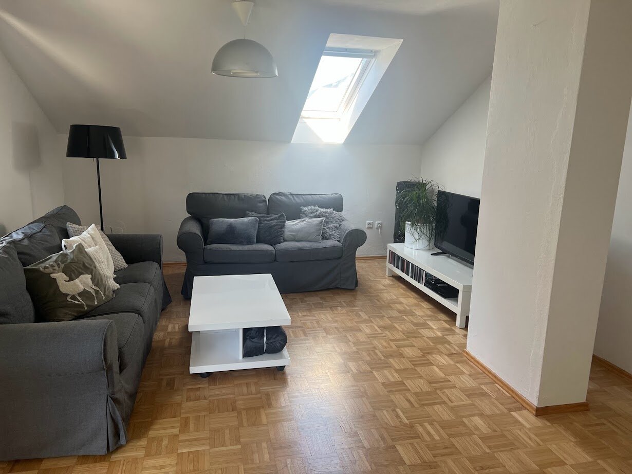 Behind the sofa it faces south, the skylight faces west