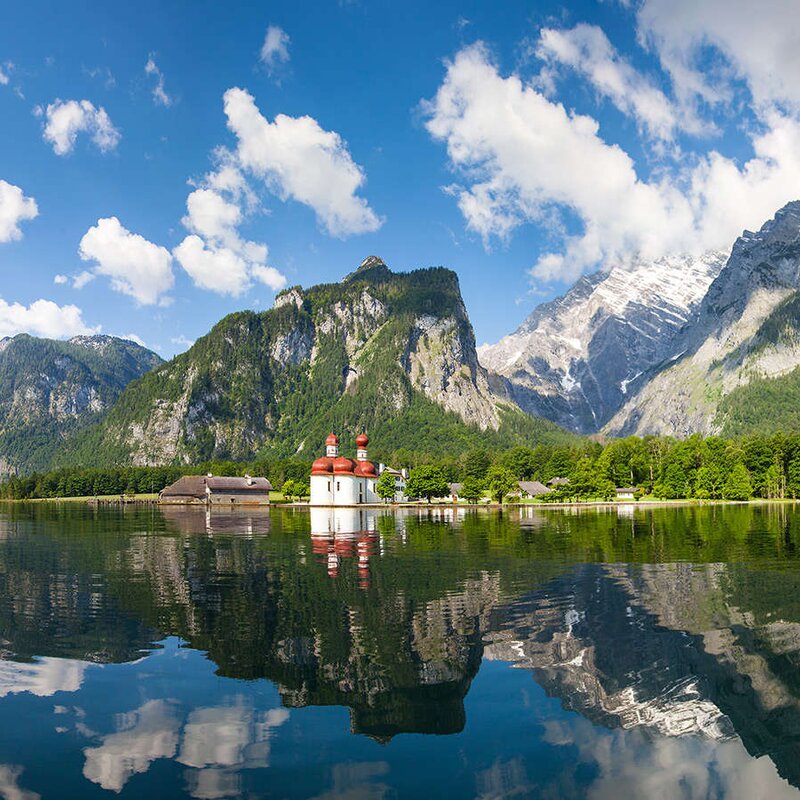 World-famous boat trip, surrounded by dramatic mountain scenery