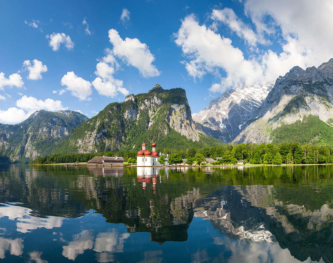 World-famous boat trip, surrounded by dramatic mountain scenery