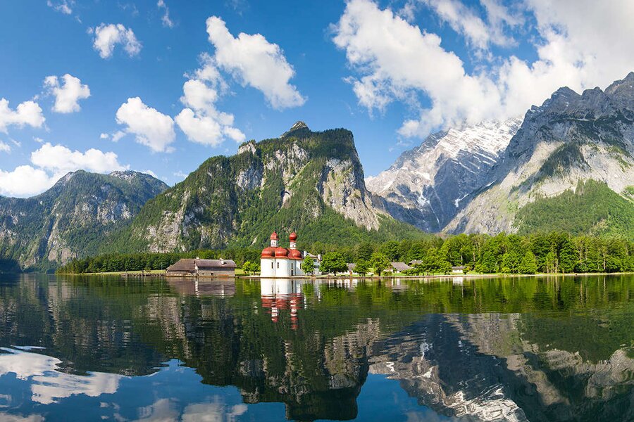 World-famous boat trip, surrounded by dramatic mountain scenery