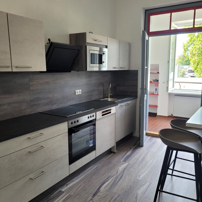 Modern fitted kitchen with appliances – 3-room apartment, short-term rental & temporary housing for 1 to 6 months in Graz