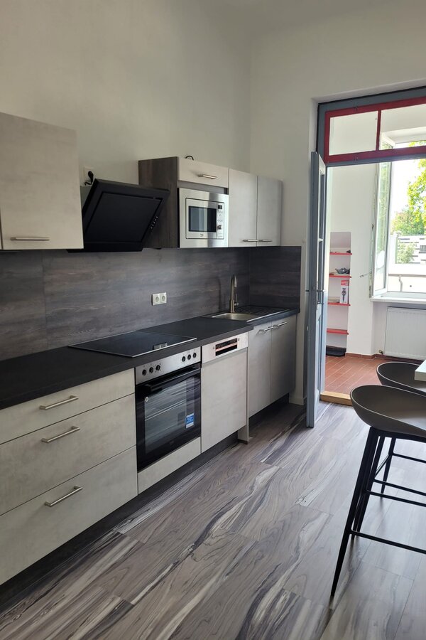 Modern fitted kitchen with appliances – 3-room apartment, short-term rental & temporary housing for 1 to 6 months in Graz