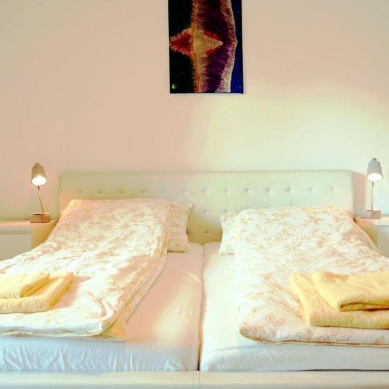 Schlafzimmer mit Balkon
