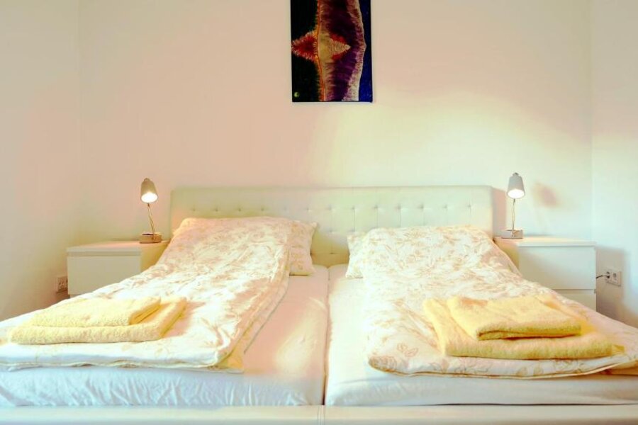 Schlafzimmer mit Balkon