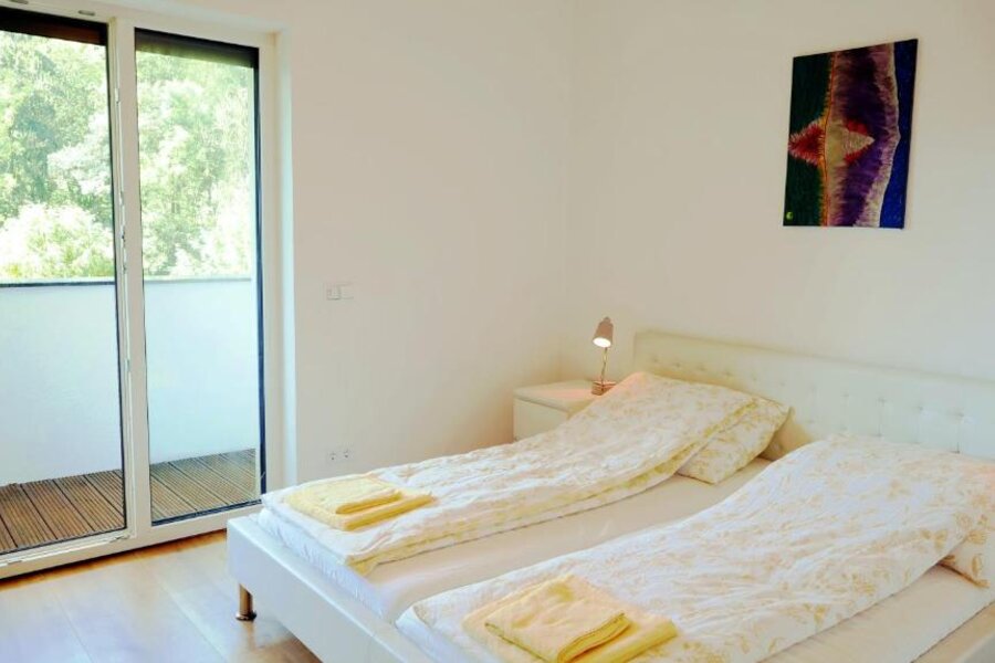 Schlafzimmer mit Balkon