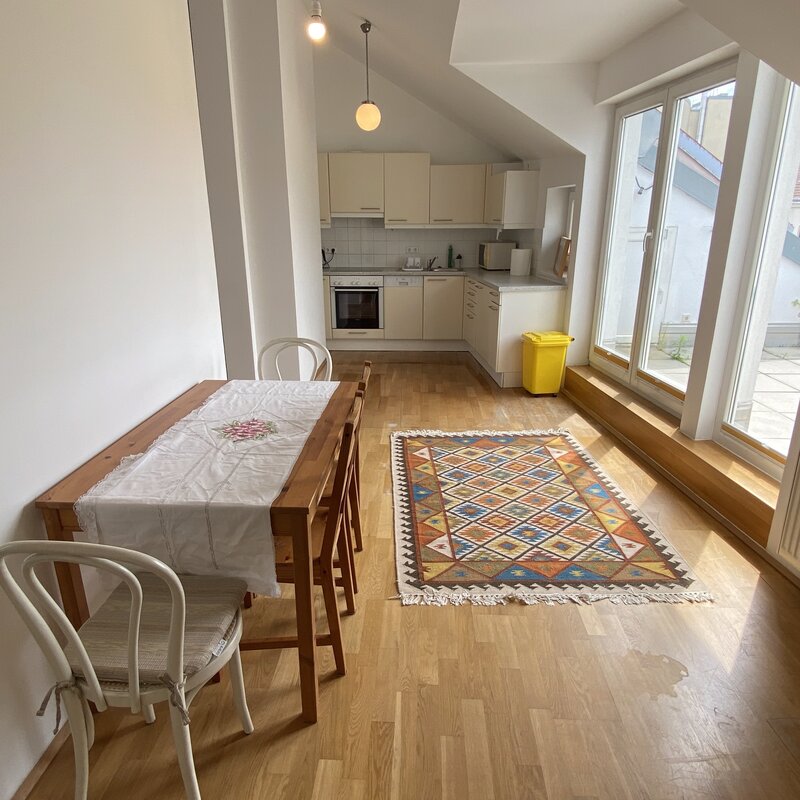 Bright living-dining area with kitchen – 2-room apartment, short-term rental & temporary housing for 1 to 6 months in Vienna