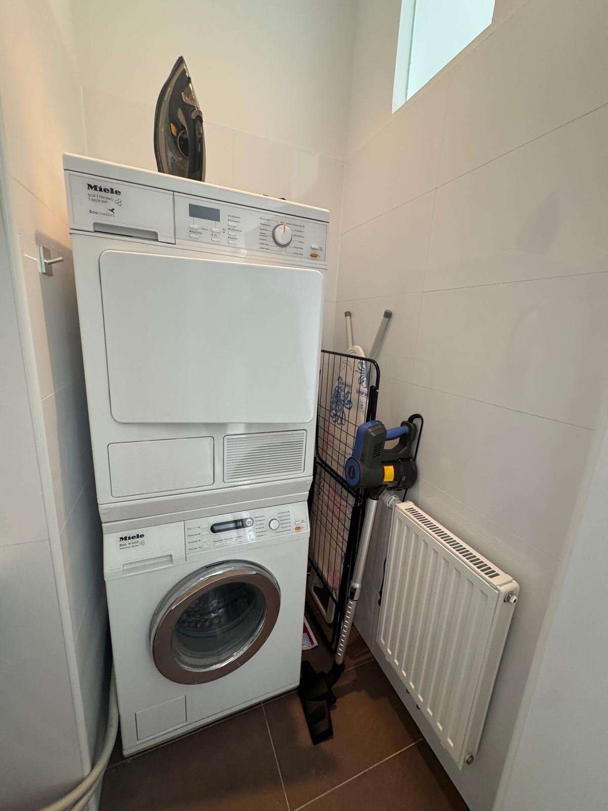 Storage room, washing machine, dryer