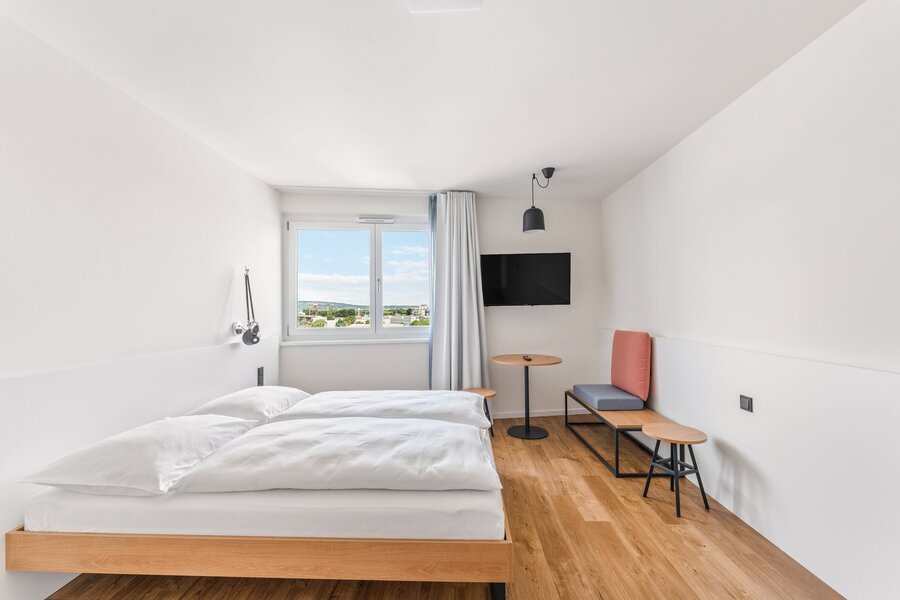 Helles Studio Apartment mit modernem Interieur & Stadtblick – Kurzzeitmiete Wien, Wohnen auf Zeit für 1 bis 6 Monate.