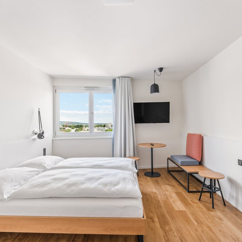 Helles 1-Zimmer Apartment mit Holzboden & TV – Kurzzeitmiete Wien, Wohnen auf Zeit für 1 bis 6 Monate
