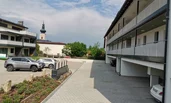 The open parking is for free. The carports can be used for a fee