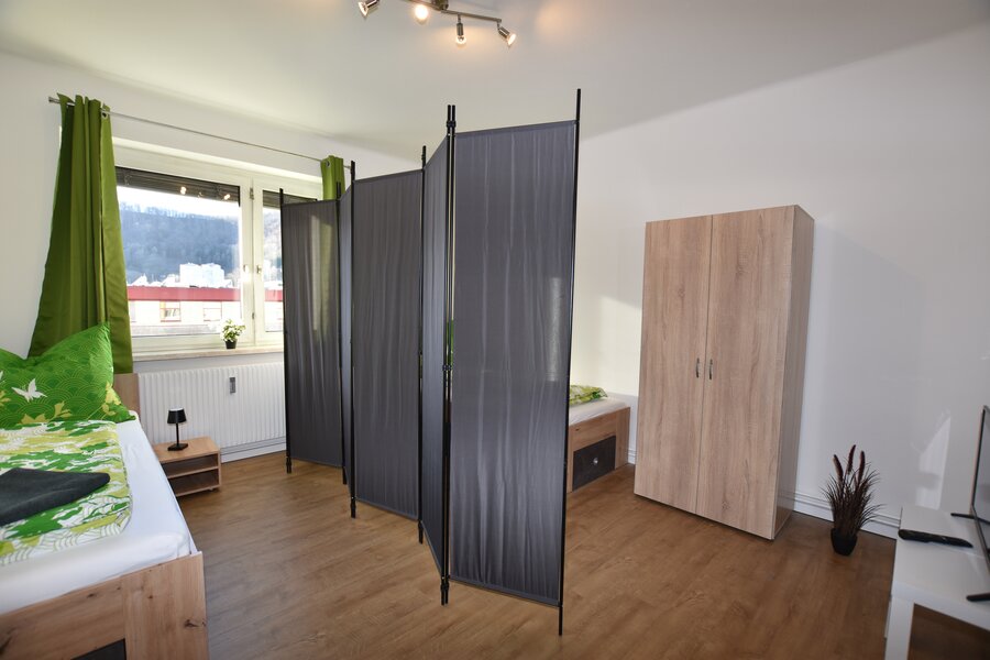 room with 2 single beds