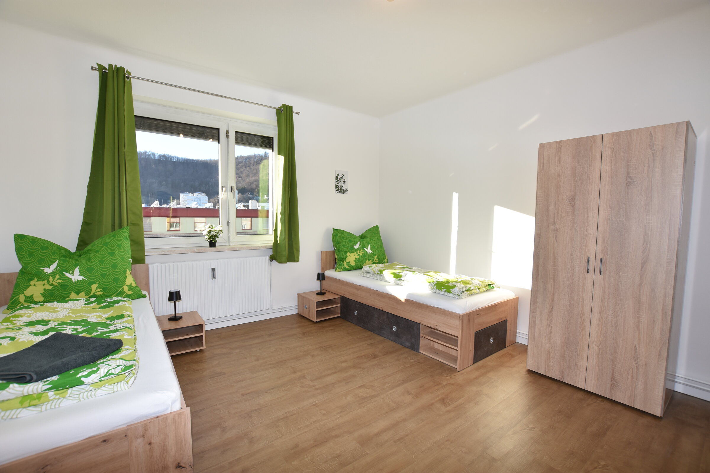 room with 2 single beds