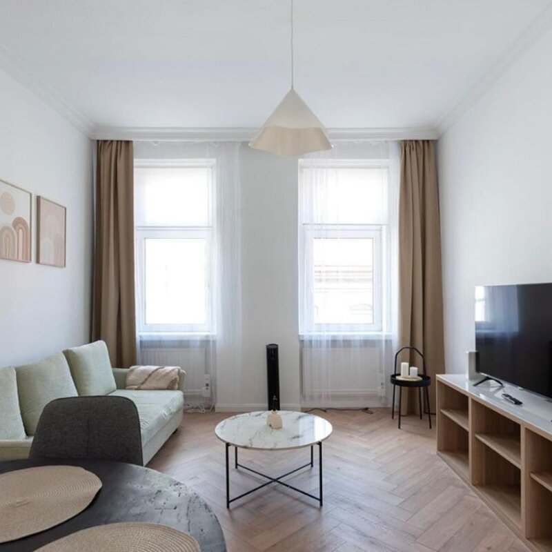 Helles Wohnzimmer mit Parkettboden: 3-Zimmer Wohnung für Kurzzeitmiete & Wohnen auf Zeit, 1 bis 6 Monate, Wien