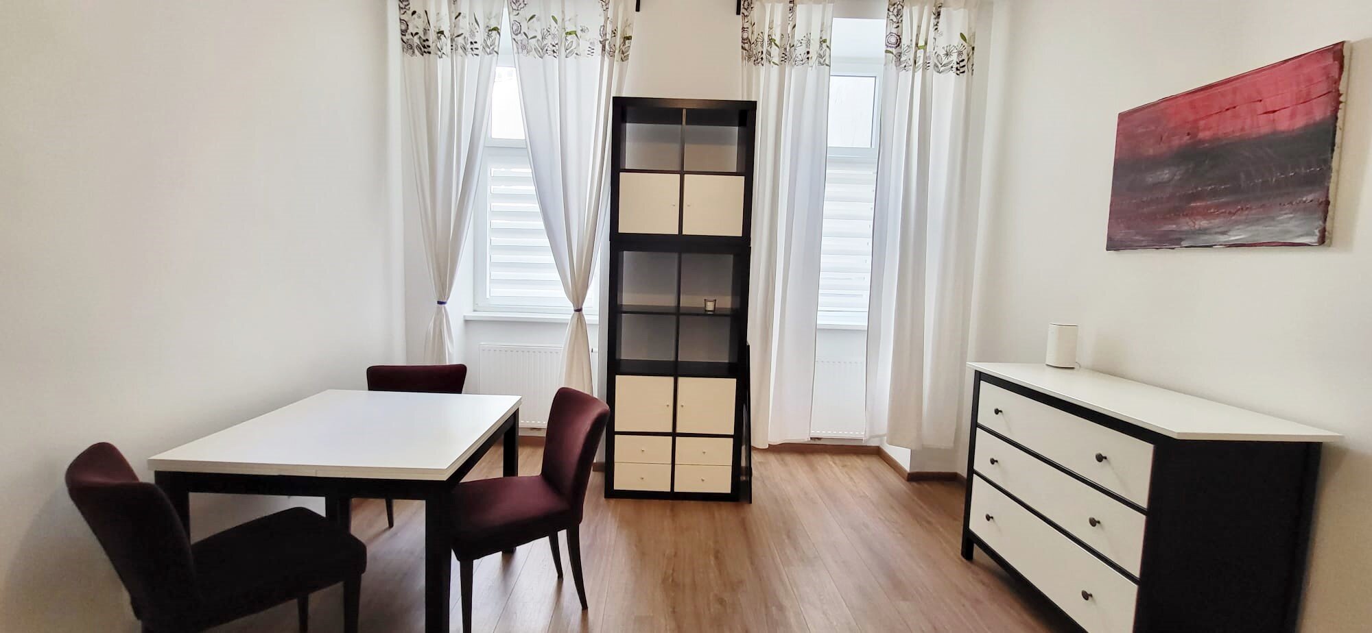 Bright living area with dining table & storage – 1-room apartment, short-term rental & temporary housing for 1 to 6 months in Vienna