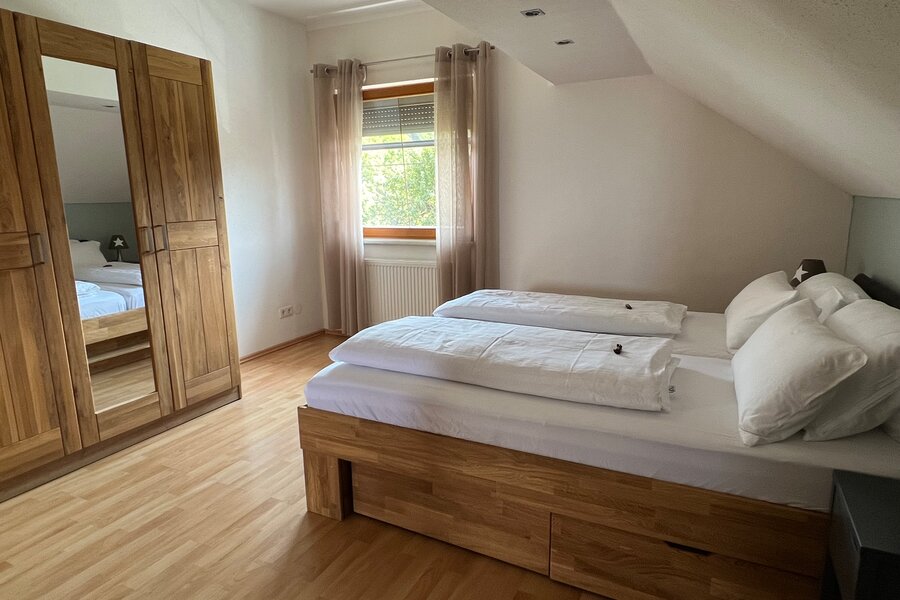 Cozy bedroom with a comfortable double bed