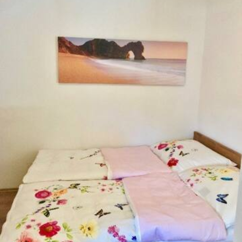 bedroom with a cozy king-size bed | © Natalie