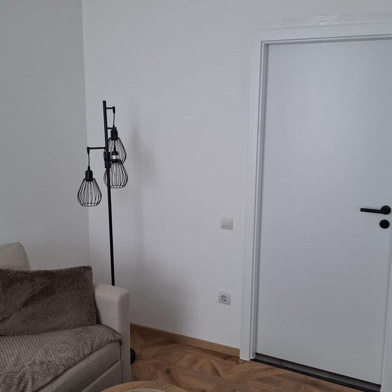 Towards the door to the kitchen/entrance hall