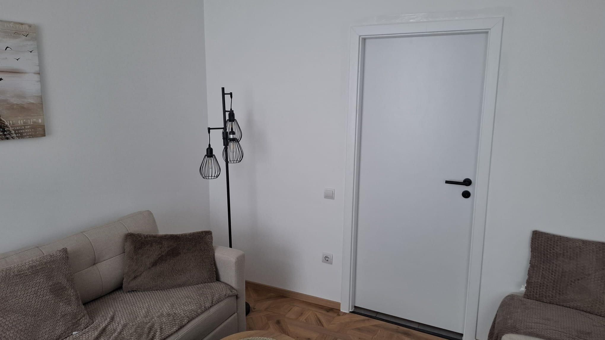 Towards the door to the kitchen/entrance hall