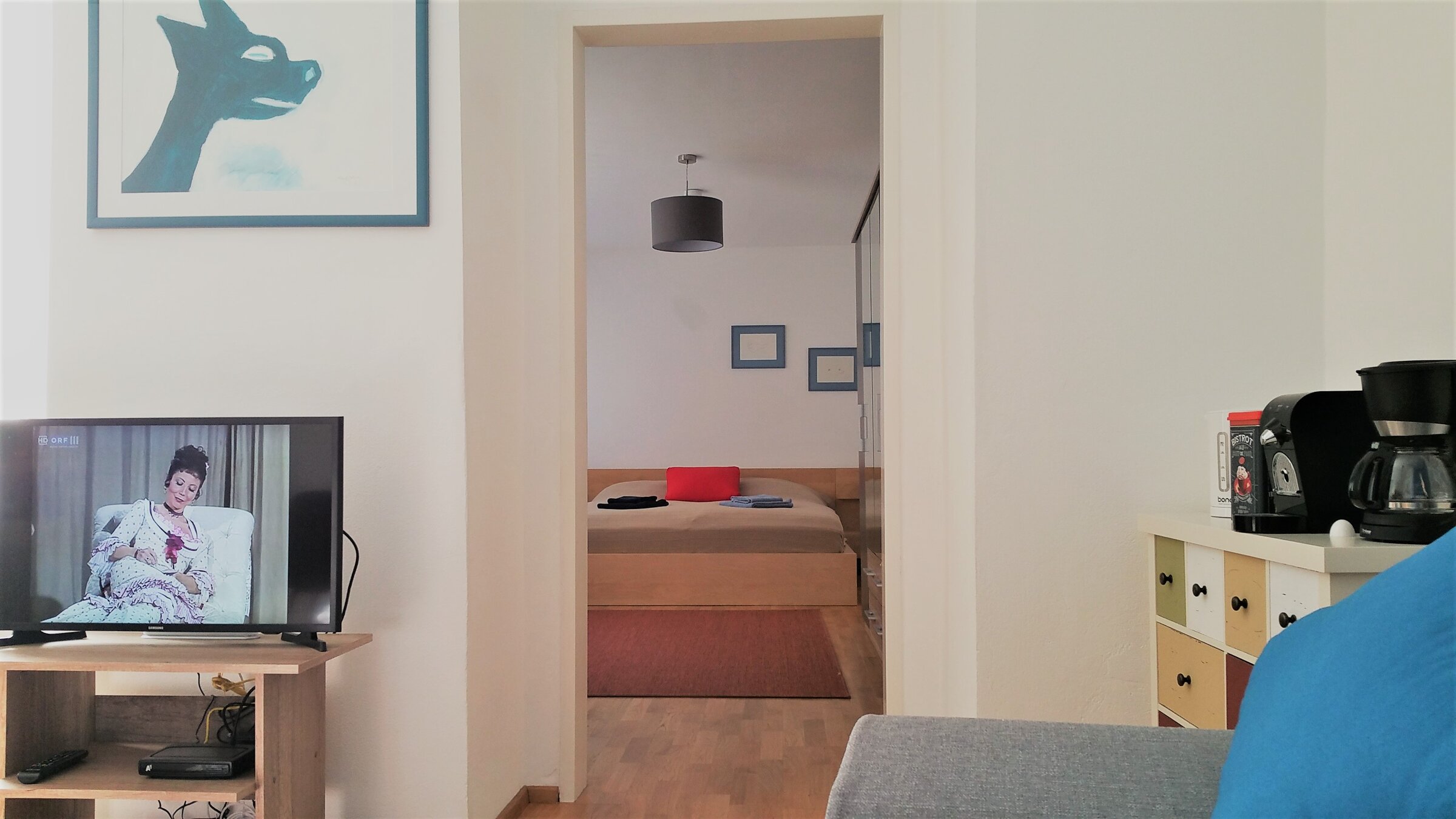 View from the living room into the bedroom