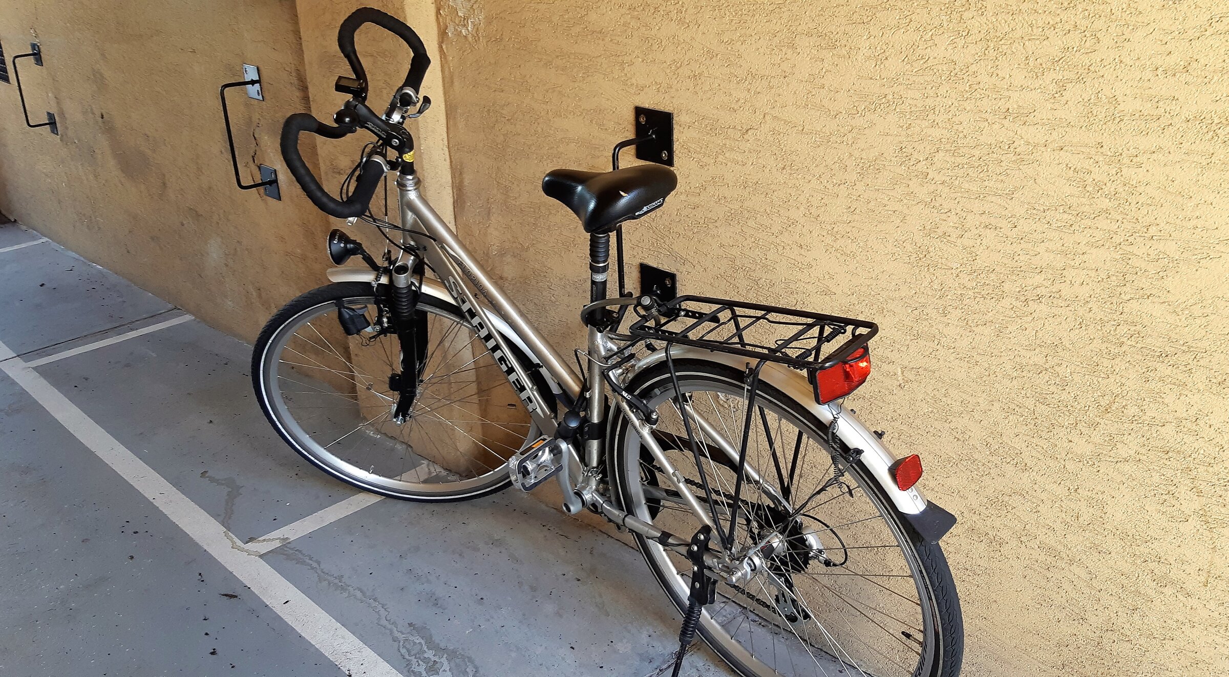 Parking space for bicycle in the covered entrance area