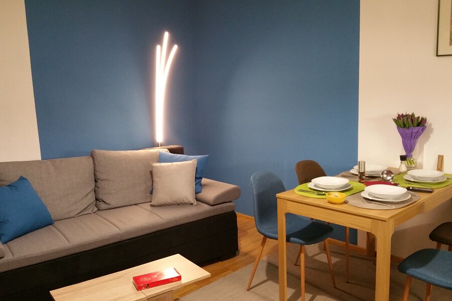 Living room - sofa-bed and dining table