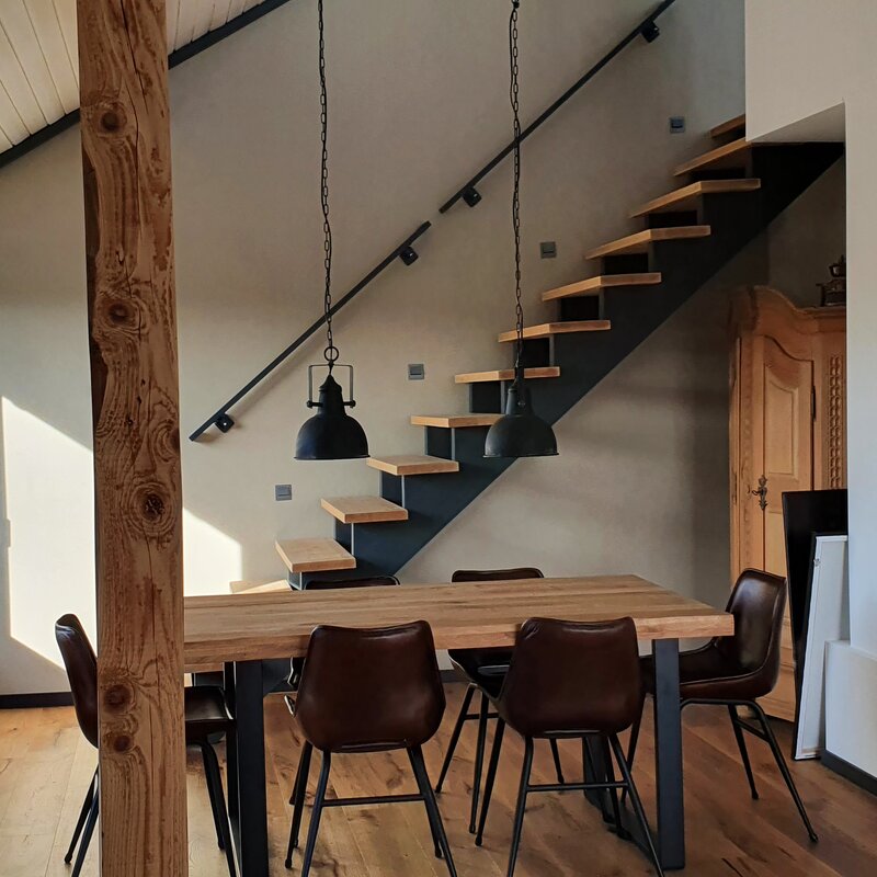 Dining area with stairs up to the bedroom