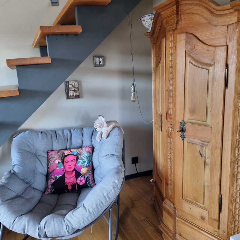 chair under the stairs