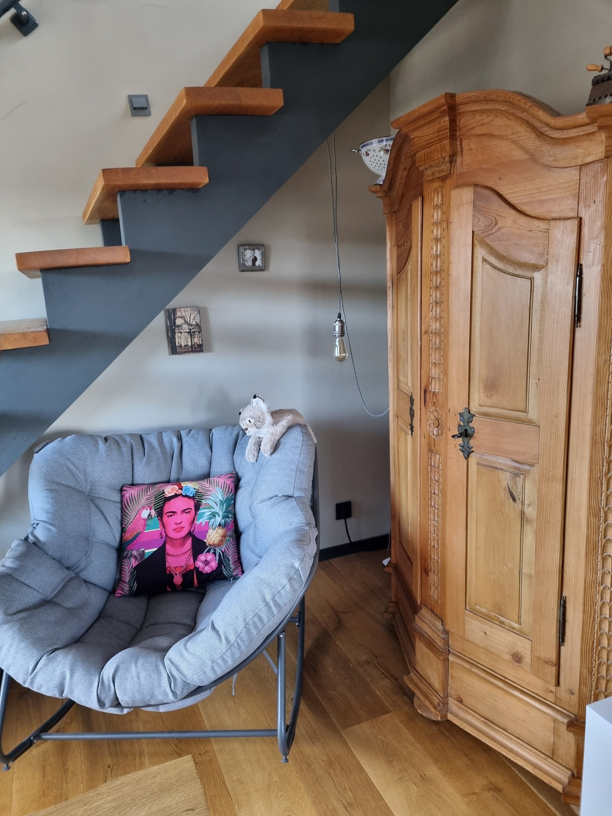 chair under the stairs