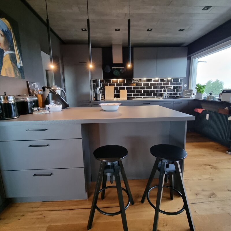 Kitchen with bar stools