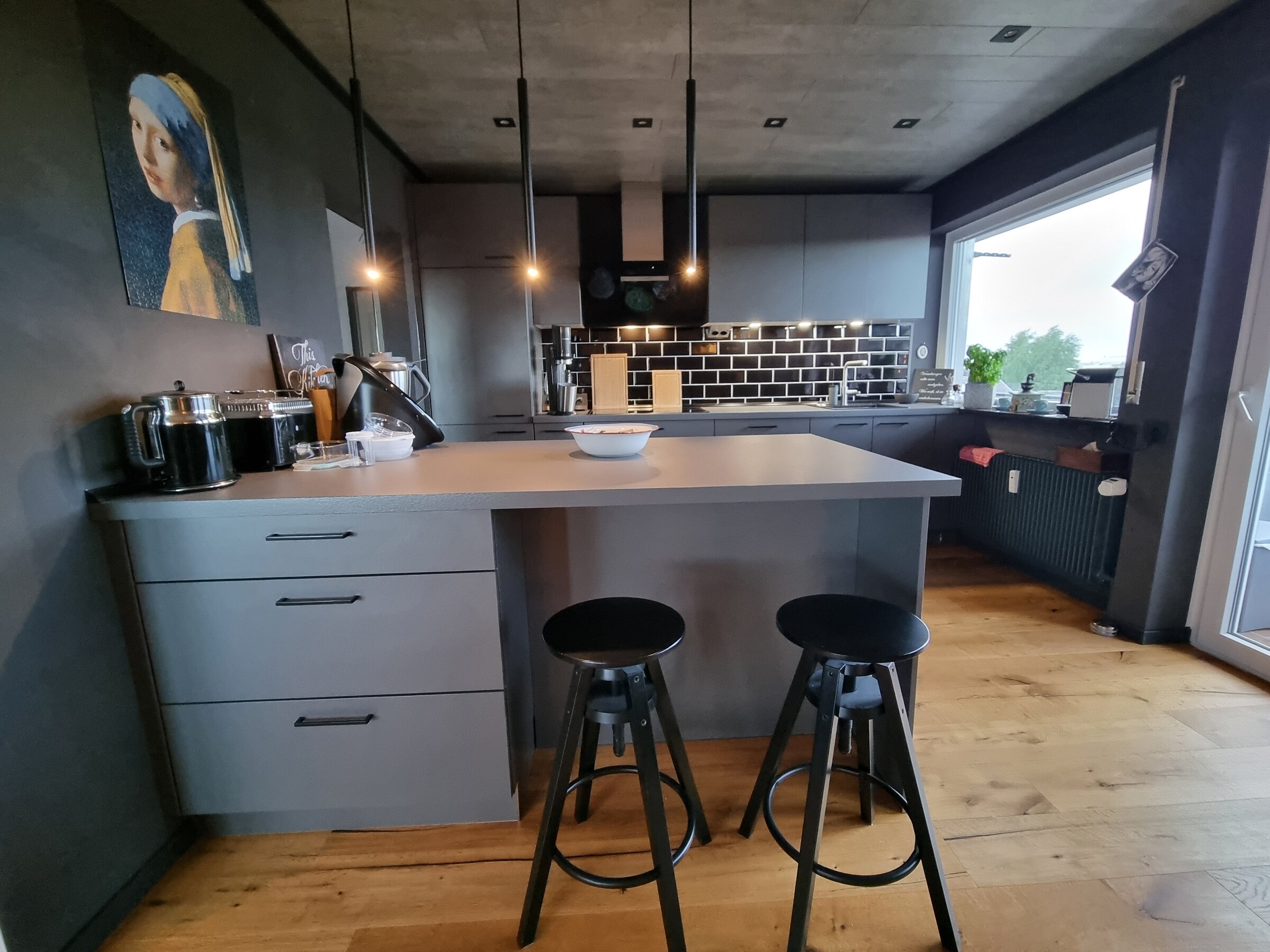Kitchen with bar stools