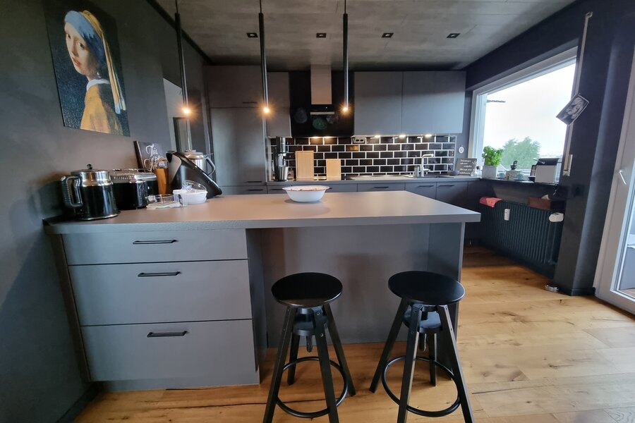Kitchen with bar stools