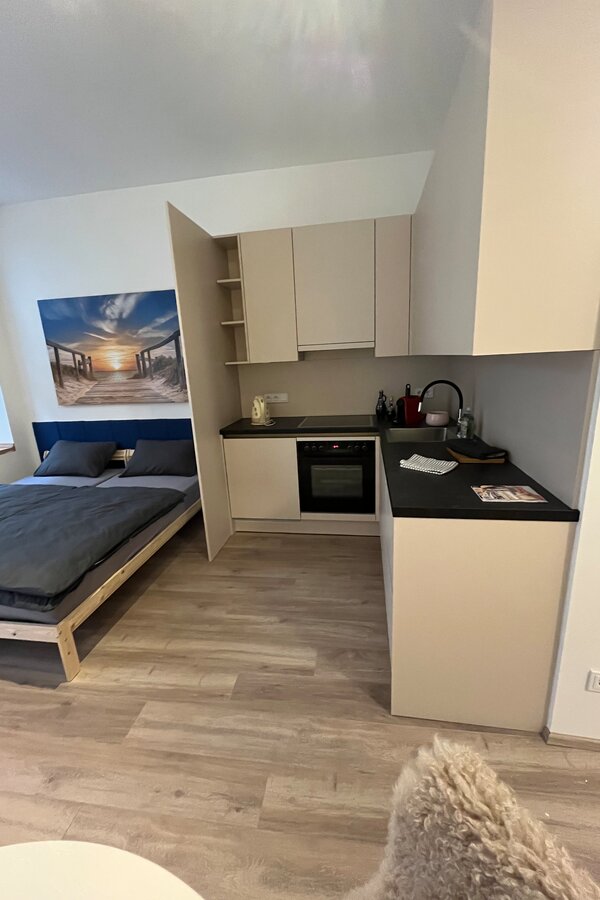 Küche und Schlafbereich