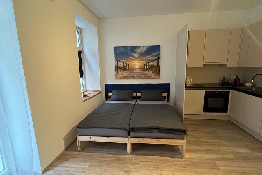 Schlafbereich und Küche
