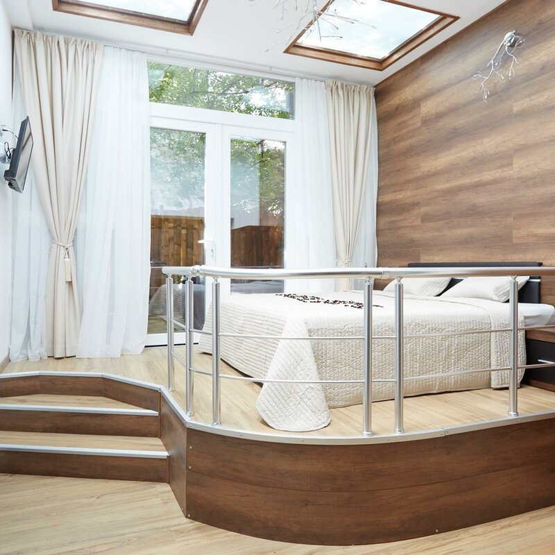 Platform bed, skylights & wood wall: 2-room apartment for short-term rental & temporary housing for 1 to 6 months in Vienna