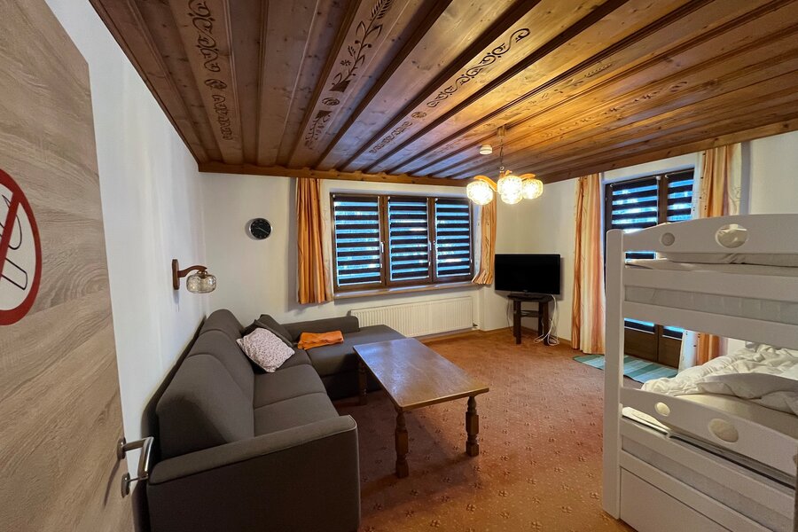 The lower drawer of the bunk bed also contains a bed.